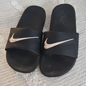 Nike Black Slide Sandals with White Swoosh Accent